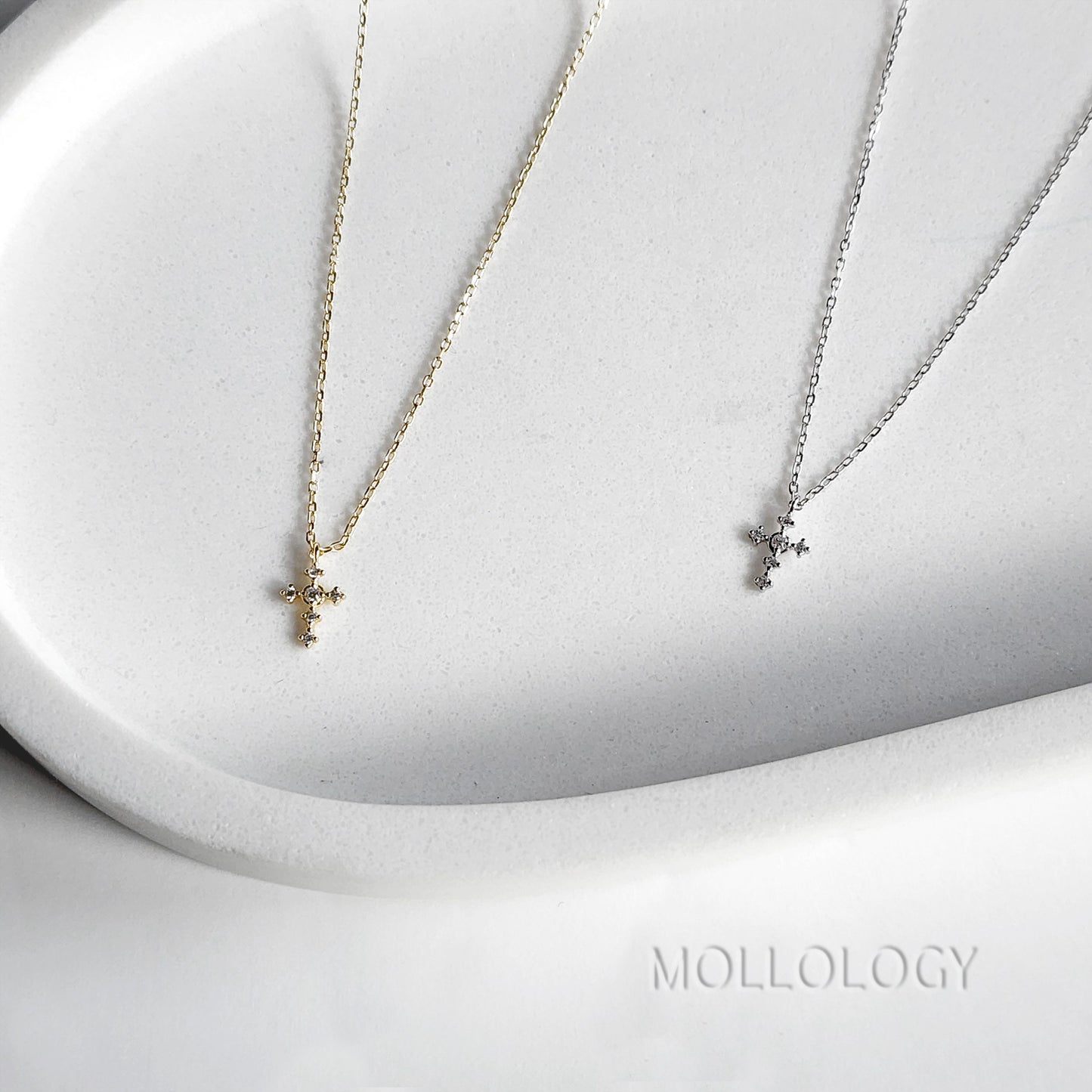 These dainty cross necklaces are a perfect blend of faith and elegance. Handcrafted with care, they feature a delicate pave cubic zirconia cross, making them an ideal gift for birthdays, anniversaries, holidays, or any special occasion. Tiny, minimalist, and timeless, they layer beautifully or stand alone.